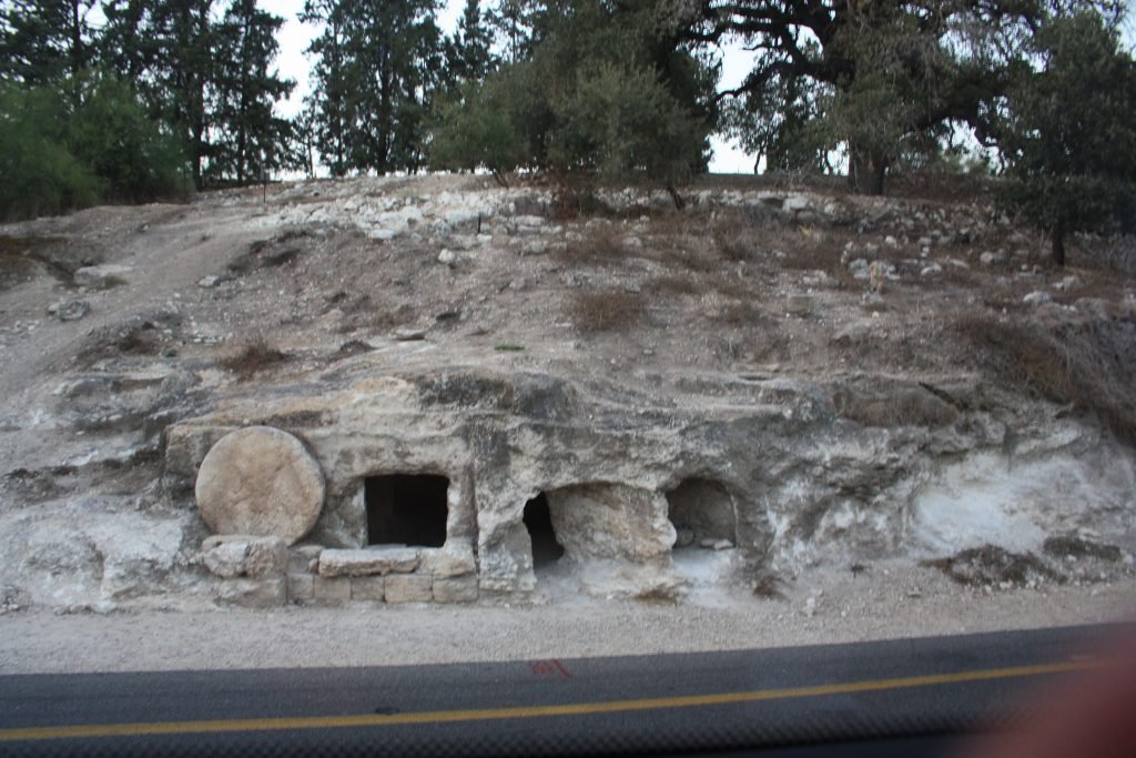 1st Century Jewish Tombs with stone to roll across by roadside, Northern Israel